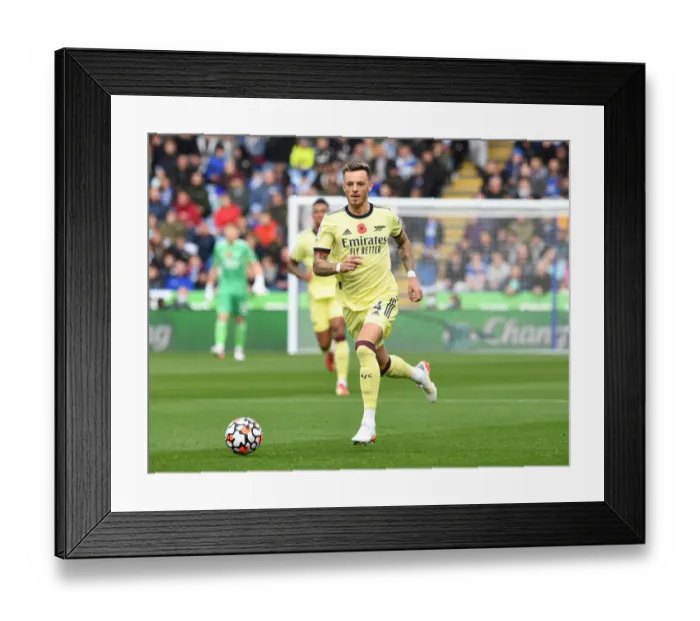 Framed Print : Arsenal's Ben White Stares Down Leicester City in Premier League Clash Framed Print : Arsenal's Ben White Stares Down Leicester City in Premier League Clash