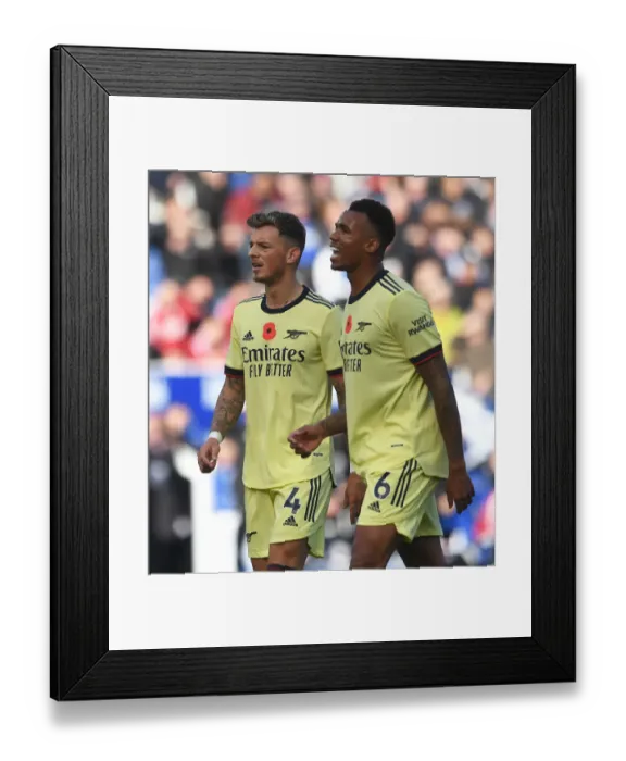Framed Print : Arsenal's White and Magalhaes in Action against Leicester City (2021-22) Framed Print : Arsenal's White and Magalhaes in Action against Leicester City (2021-22)
