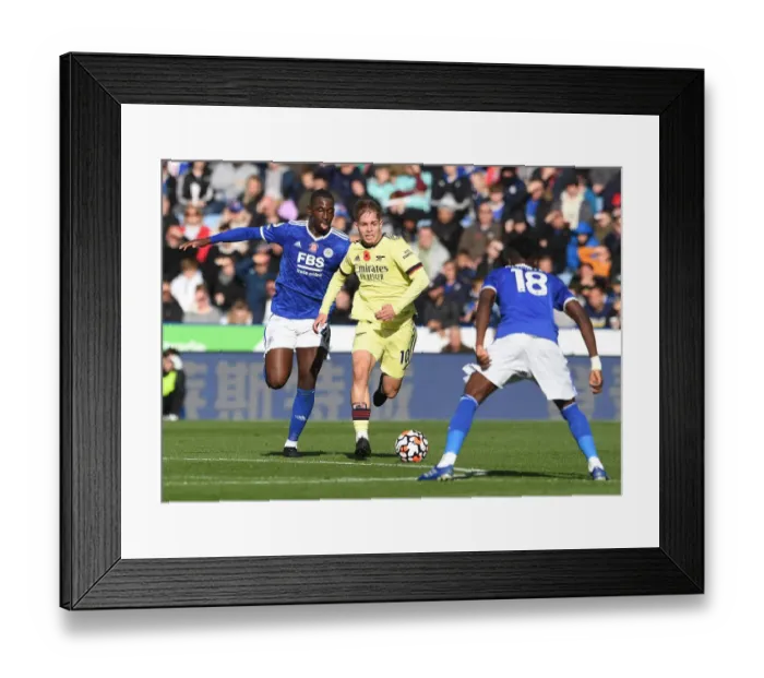 Framed Print : Arsenal's Emile Smith Rowe Clashes with Leicester's Boubakary Soumare in Premier League Showdown
