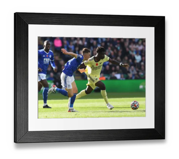 Framed Print : Saka vs Thomas: A Premier League Battle at The King Power Stadium - Arsenal vs Leicester City, 2021-22 Framed Print : Saka vs Thomas: A Premier League Battle at The King Power Stadium - Arsenal vs Leicester City, 2021-22