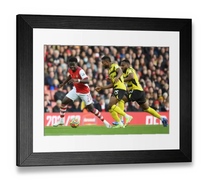 Framed Print : Arsenal's Bukayo Saka Outwits Watford Defenders with Slick Dribble Framed Print : Arsenal's Bukayo Saka Outwits Watford Defenders with Slick Dribble
