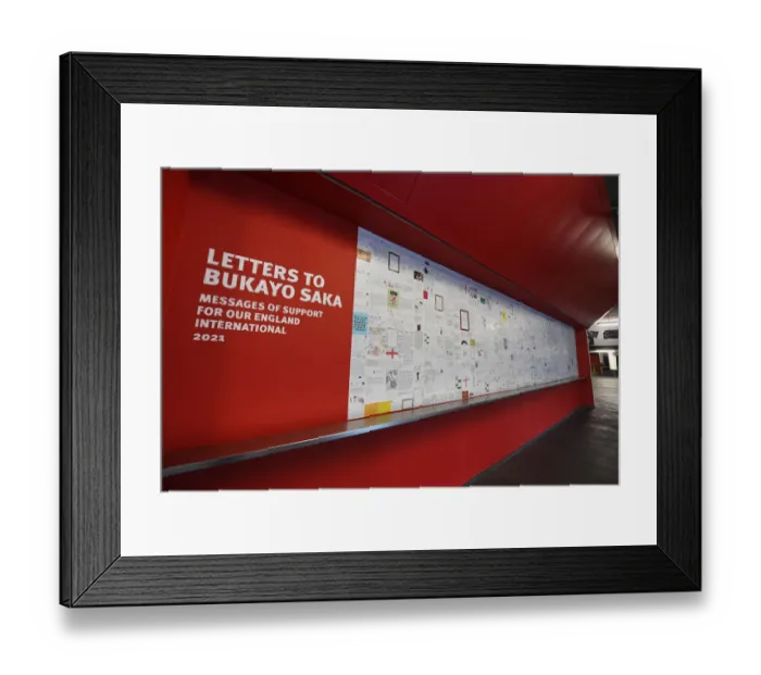 Framed Print : Sea of Support: Arsenal Fans Unite for Bukayo Saka at Emirates Stadium