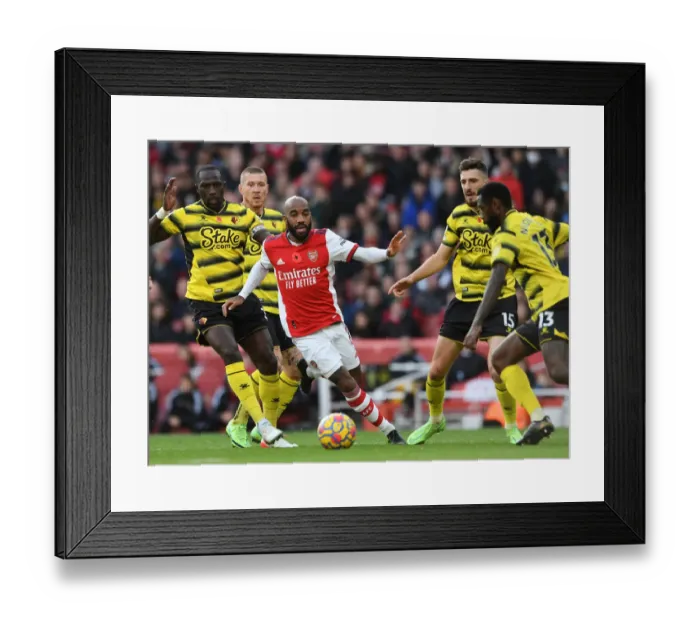 Framed Print : Lacazette vs. Sissoko: A Premier League Showdown at Emirates Stadium - Arsenal vs. Watford