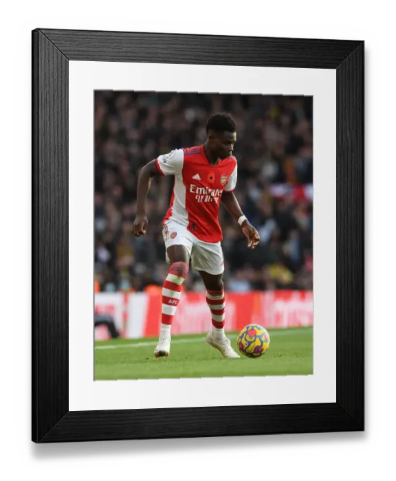 Framed Print : Arsenal's Bukayo Saka in Action: Arsenal vs. Watford (2021-22)