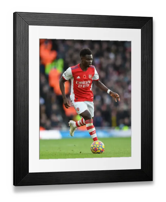 Framed Print : Bukayo Saka in Action: Arsenal's Star Performance Against Watford (2021-22)