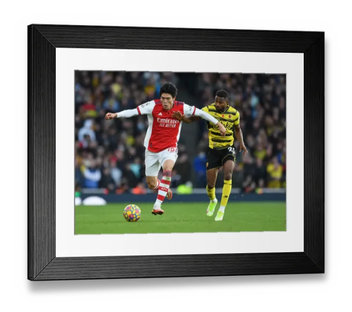 Framed Print : Tomiyasu vs. Dennis: A Premier League Showdown at Emirates Stadium Framed Print : Tomiyasu vs. Dennis: A Premier League Showdown at Emirates Stadium