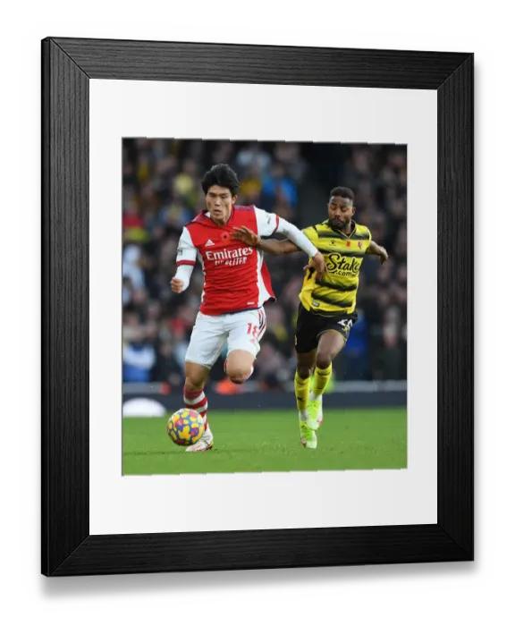 Framed Print : Tomiyasu vs. Dennis: A Premier League Showdown at Emirates Stadium Framed Print : Tomiyasu vs. Dennis: A Premier League Showdown at Emirates Stadium