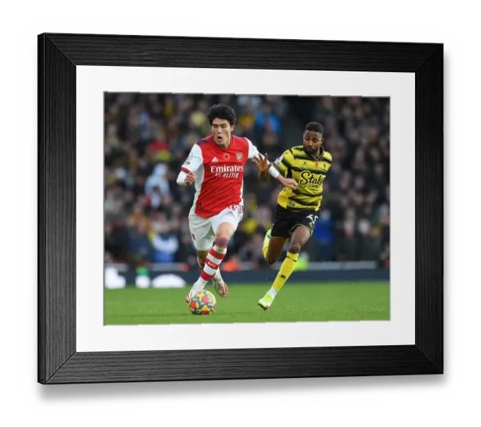 Framed Print : Tomiyasu vs. Dennis: A Premier League Battle at Emirates Stadium