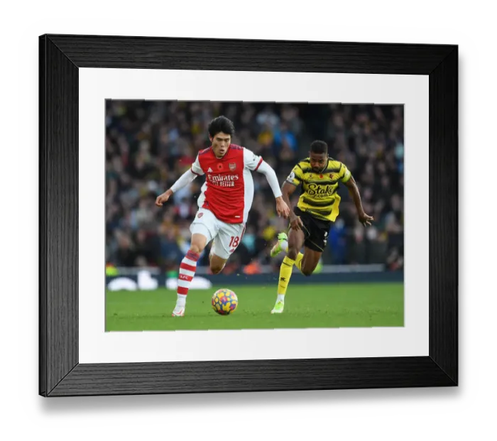 Framed Print : Tomiyasu vs. Dennis: A Premier League Showdown at Emirates Stadium