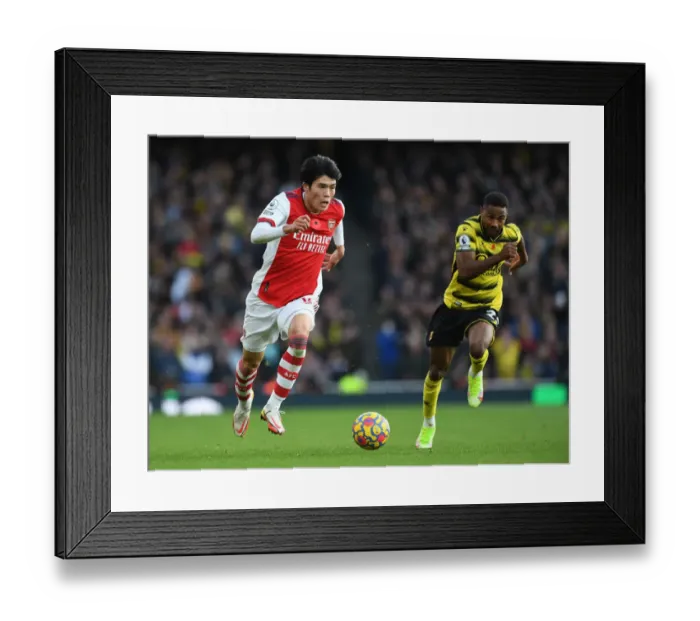 Framed Print : Tomiyasu vs. Dennis: A Clash at Emirates Stadium - Arsenal vs. Watford (2021-22)