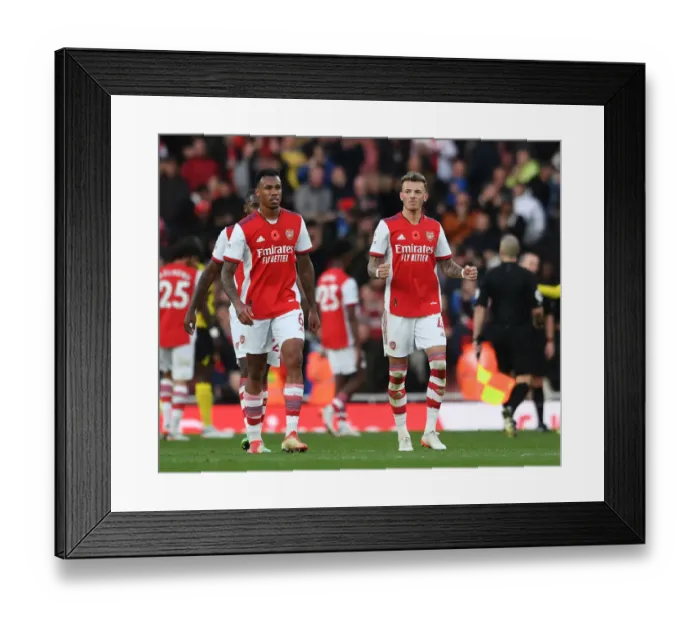 Framed Print : Arsenal's Magalhaes and White: Victory Celebration after Arsenal v Watford, 2021-22 Premier League
