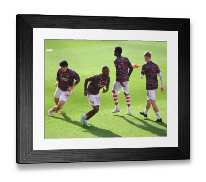 Framed Print : Arsenal vs Watford: Nuno Tavares Warming Up Ahead of Premier League Clash at Emirates Stadium