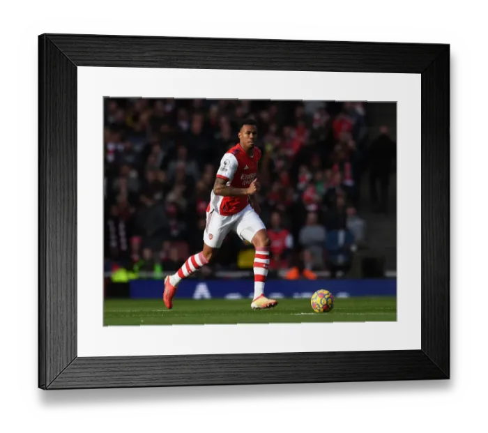 Framed Print : Arsenal's Gabriel Magalhaes in Action Against Watford - Premier League 2021-22