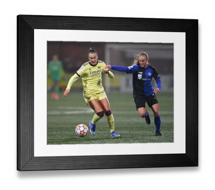 Framed Print : Arsenal's Caitlin Foord Faces Off Against HB Koge's Maddie Pokorny in UEFA Women's Champions League Clash