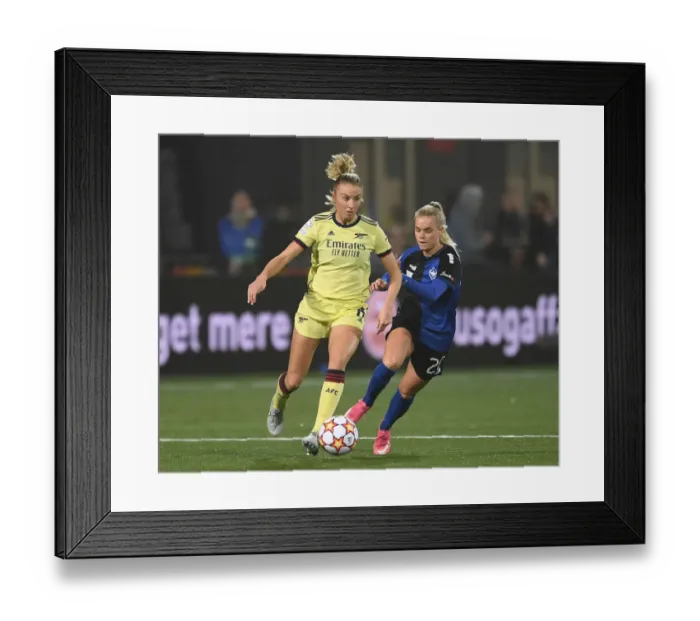Framed Print : Leah Williamson Faces Off Against Cornelia Kramer: HB Koge vs. Arsenal Women's FC, UEFA Womens Champions League