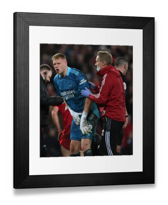 Framed Print : Arsenal's Aaron Ramsdale Receives Treatment from Physio during Liverpool vs Arsenal (2021-22) Framed Print : Arsenal's Aaron Ramsdale Receives Treatment from Physio during Liverpool vs Arsenal (2021-22)