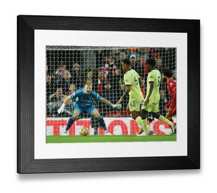 Framed Print : Arsenal's Aaron Ramsdale Stands Firm Against Liverpool at Anfield (Premier League 2021-22) Framed Print : Arsenal's Aaron Ramsdale Stands Firm Against Liverpool at Anfield (Premier League 2021-22)