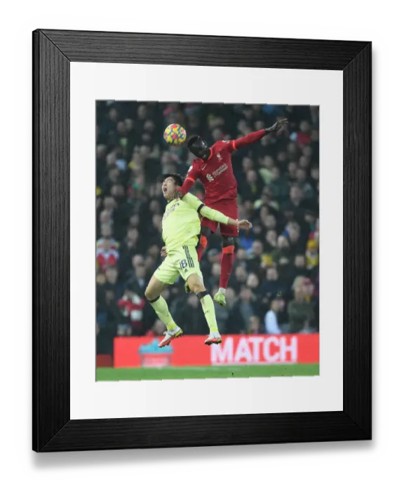 Framed Print : Tomiyasu vs. Mane: A Foul Rivalry - Arsenal vs. Liverpool at Anfield