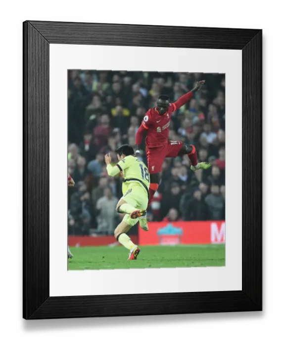 Framed Print : Clash at Anfield: Intense Rivalry - Tomiyasu Fouls Mane (Premier League 2021-22) Framed Print : Clash at Anfield: Intense Rivalry - Tomiyasu Fouls Mane (Premier League 2021-22)