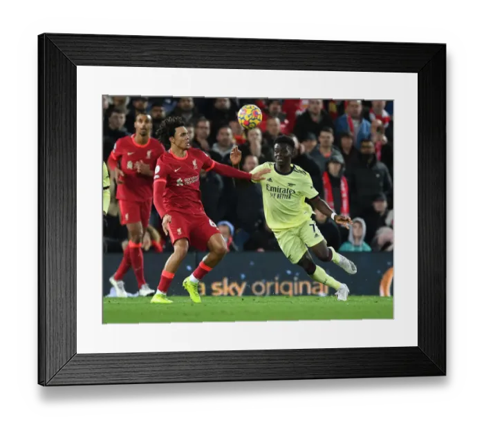 Framed Print : Clash of Stars: Saka vs. Alexander-Arnold - Liverpool vs. Arsenal Rivalry