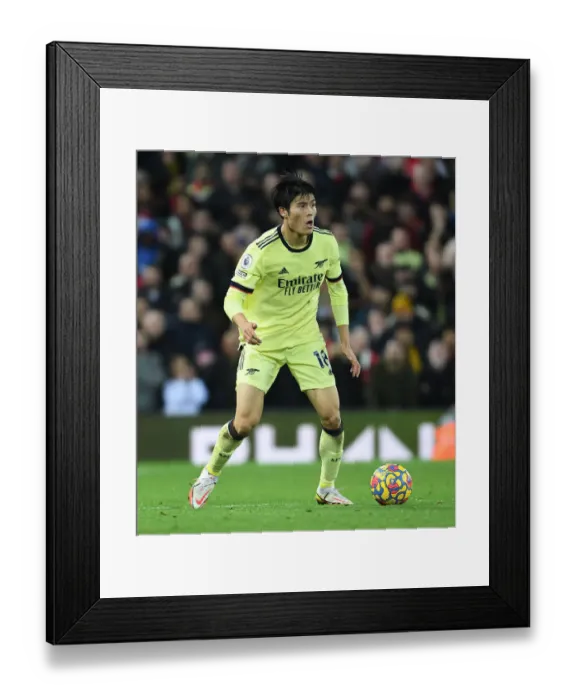 Framed Print : Tomiyasu's Unyielding Display: Arsenal's Defiant Performance Against Liverpool (2021-22 Premier League)