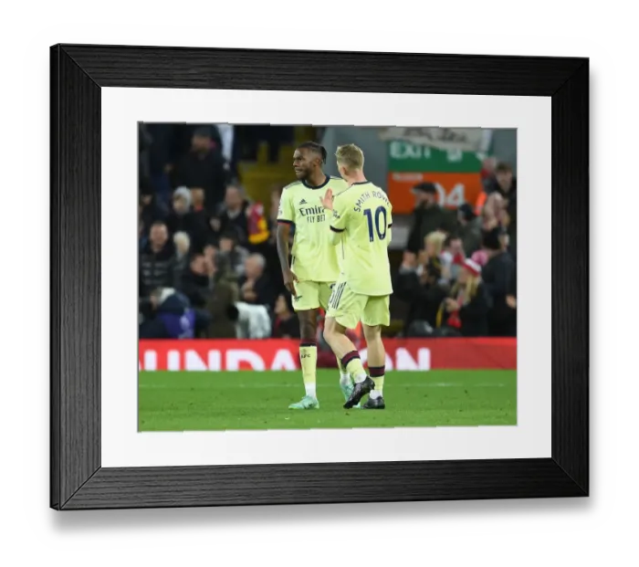 Framed Print : Comfort and Support: Emile Smith Rowe Consoles Distraught Nuno Tavares After Liverpool's Second Goal Framed Print : Comfort and Support: Emile Smith Rowe Consoles Distraught Nuno Tavares After Liverpool's Second Goal