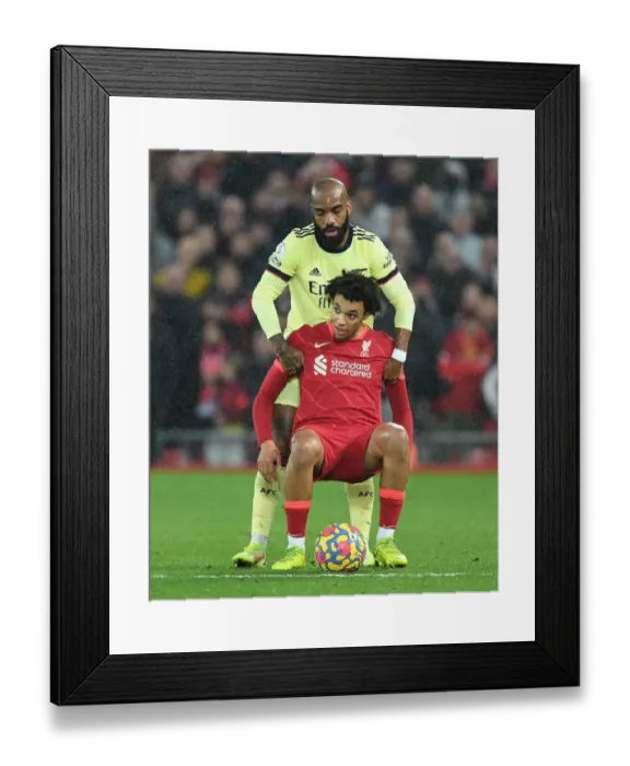 Framed Print : Lacazette Consoles Trent Alexander-Arnold: A Moment of Sportsmanship in the Premier League Clash Between Liverpool and Arsenal (November 2021)