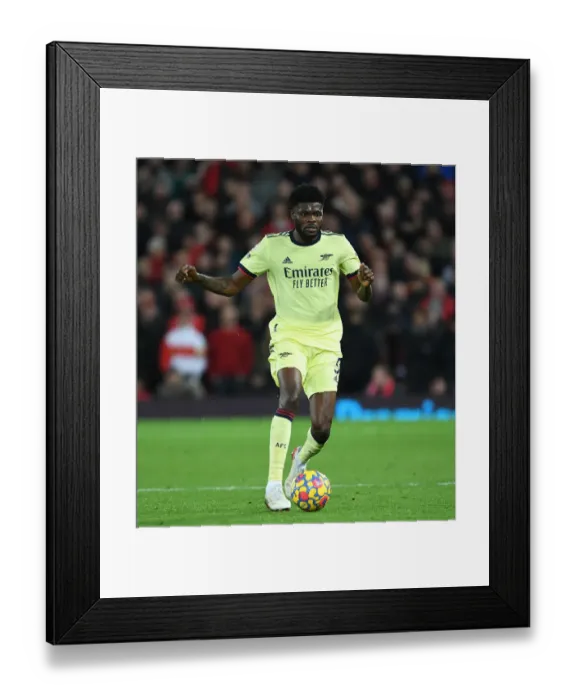 Framed Print : Thomas Partey Faces Off Against Liverpool in Premier League Clash