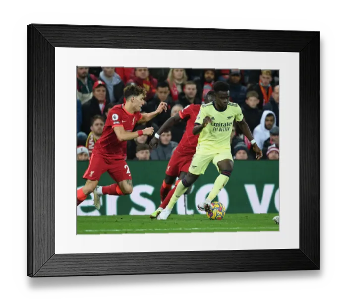 Framed Print : Bukayo Saka Breaks Past Tsimikas: Liverpool vs Arsenal, Premier League 2021-22