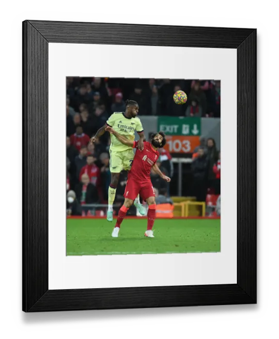 Framed Print : Nuno Tavares vs. Mo Salah: Intense Clash at Anfield - Liverpool vs. Arsenal, Premier League 2021-22 Framed Print : Nuno Tavares vs. Mo Salah: Intense Clash at Anfield - Liverpool vs. Arsenal, Premier League 2021-22