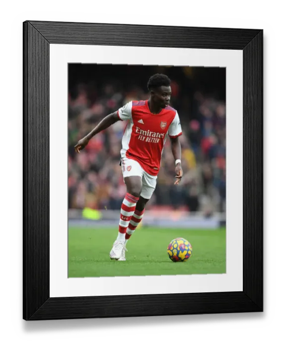 Framed Print : Arsenal's Bukayo Saka in Action: Premier League 2021-22 - Arsenal vs Newcastle United Framed Print : Arsenal's Bukayo Saka in Action: Premier League 2021-22 - Arsenal vs Newcastle United