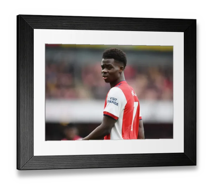 Framed Print : Bukayo Saka: Arsenal Star Shines in Premier League Clash Against Newcastle United
