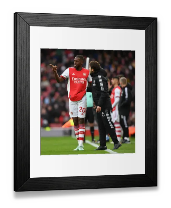 Framed Print : Arsenal Coach Nuno Tavares: Focused Preparation at Emirates Stadium (Arsenal v Newcastle United, 2021-22)