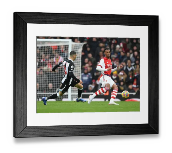Framed Print : Arsenal vs Newcastle United: Gabriel vs Almiron - Premier League Clash at Emirates Stadium