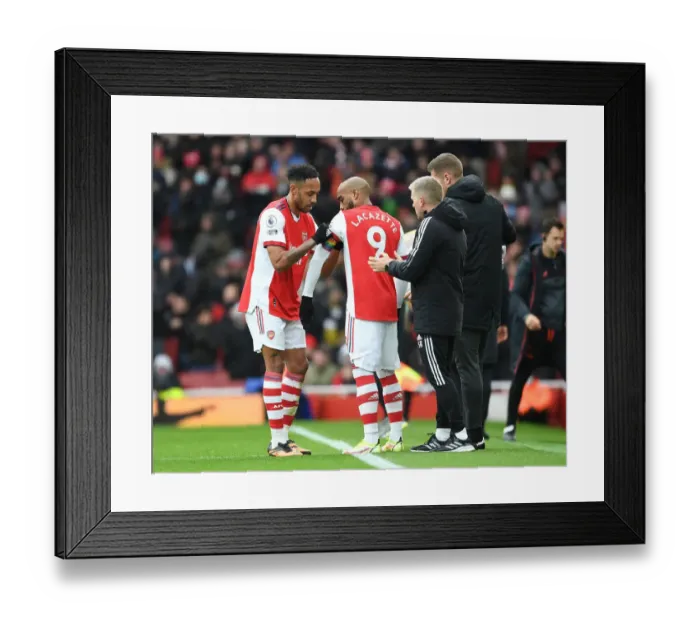 Framed Print : Arsenal: Aubameyang Passes Captain's Armband to Lacazette vs Newcastle United (2021-22) Framed Print : Arsenal: Aubameyang Passes Captain's Armband to Lacazette vs Newcastle United (2021-22)