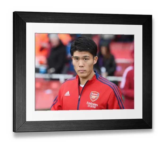 Framed Print : Arsenal's Tomiyasu Gears Up for Newcastle Battle in Premier League