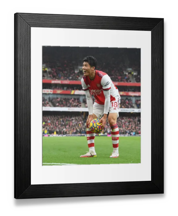 Framed Print : Arsenal's Tomiyasu in Action: Arsenal vs. Newcastle United, Premier League 2021-22