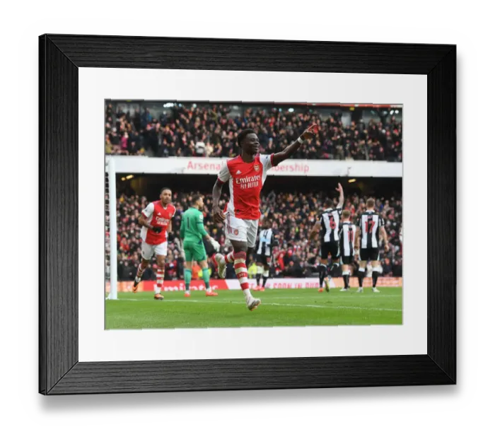 Framed Print : Saka Scores the Winner: Arsenal Triumphs over Newcastle United in Premier League 2021-22 Framed Print : Saka Scores the Winner: Arsenal Triumphs over Newcastle United in Premier League 2021-22