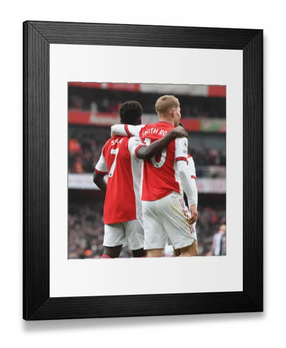 Framed Print : Arsenal's Saka and Smith Rowe: Dazzling Duo Delivers Brilliant Brace Against Newcastle United (2021-22)