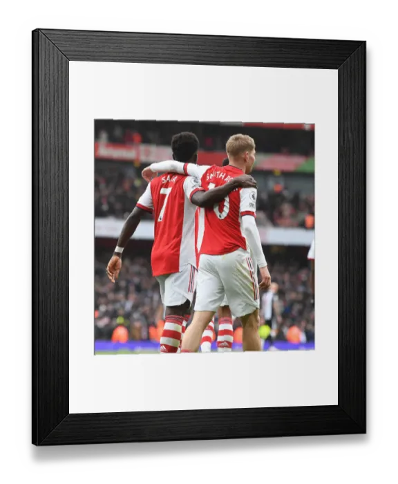 Framed Print : Arsenal's Saka and Smith Rowe Celebrate Goals Against Newcastle United (2021-22) Framed Print : Arsenal's Saka and Smith Rowe Celebrate Goals Against Newcastle United (2021-22)