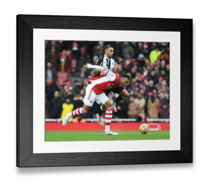 Framed Print : Magalhaes vs Wilson: A Football Battle at the Emirates - Arsenal vs Newcastle United, Premier League 2021-22