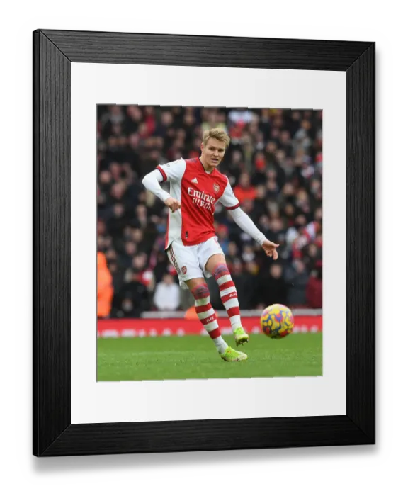 Framed Print : Arsenal's Martin Odegaard Shines in Premier League Clash Against Newcastle United