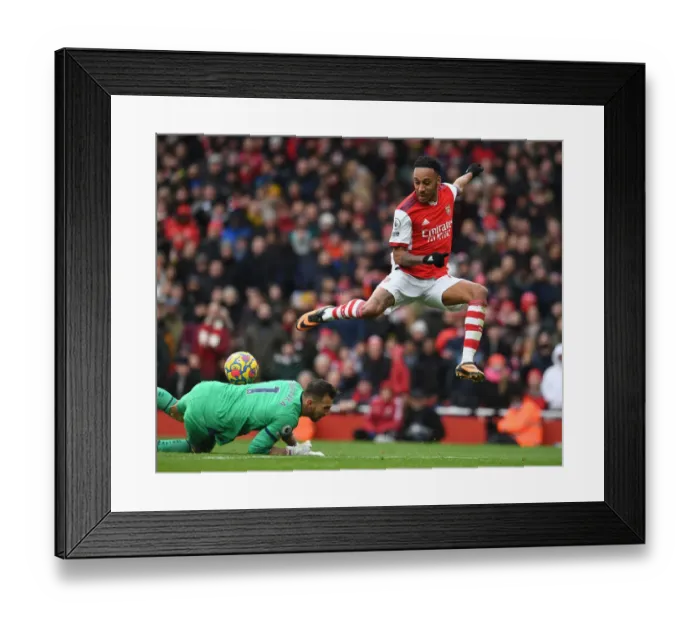 Framed Print : Arsenal's Aubameyang Clashes with Newcastle's Dubravka in Premier League Showdown Framed Print : Arsenal's Aubameyang Clashes with Newcastle's Dubravka in Premier League Showdown