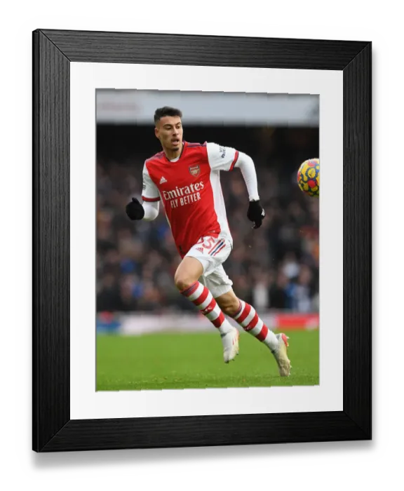 Framed Print : Martinelli's Star Performance: Arsenal Triumphs Over Newcastle United, Premier League 2021-22
