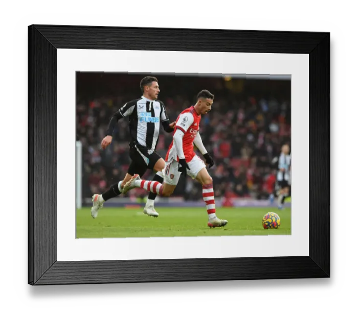 Framed Print : Arsenal's Martinelli Clashes with Newcastle's Schar in Premier League Showdown Framed Print : Arsenal's Martinelli Clashes with Newcastle's Schar in Premier League Showdown