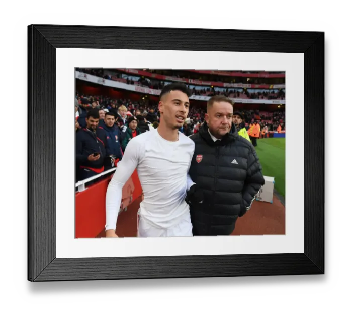 Framed Print : Arsenal's Gabriel Martinelli Consoles Peter White after Arsenal vs Newcastle United Match Framed Print : Arsenal's Gabriel Martinelli Consoles Peter White after Arsenal vs Newcastle United Match