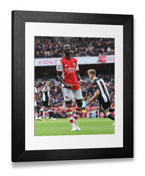 Framed Print : Bukayo Saka in Action: Arsenal vs Newcastle United, Premier League 2021-22 Framed Print : Bukayo Saka in Action: Arsenal vs Newcastle United, Premier League 2021-22