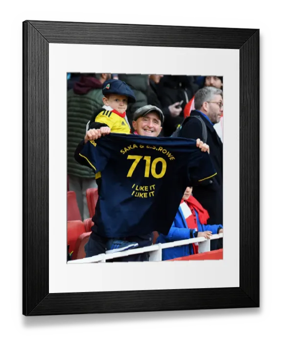 Framed Print : Arsenal Fan and Son's Emotional Reaction after the Match: Arsenal vs Newcastle United, Premier League 2021-22