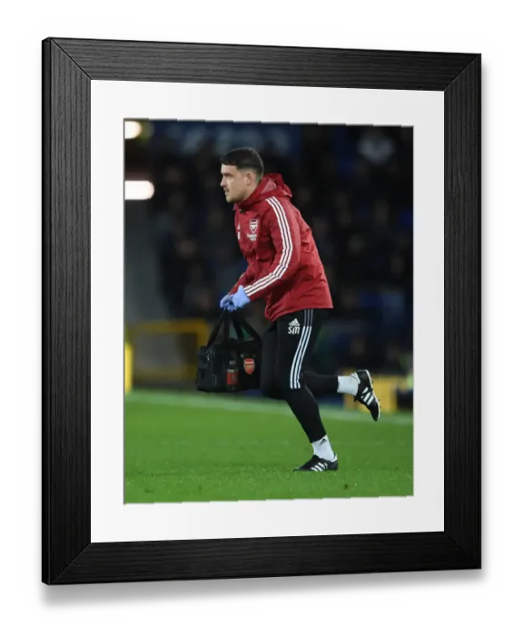 Framed Print : Arsenal Physio in Action: Everton vs Arsenal, Premier League 2020-21