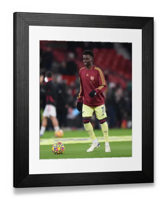 Framed Print : Arsenal's Bukayo Saka Gears Up for Manchester United Clash in Premier League (Manchester United vs Arsenal, 2020-21)